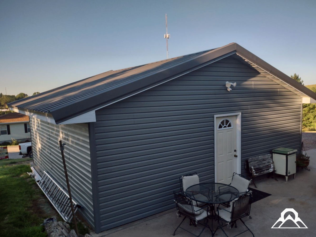 residential-Project_6_roof-replacement_new_metal_roof_gutters_downspouts_siding_windows_after_3