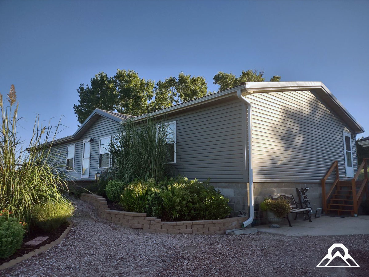residential-Project_6_roof-replacement_new_metal_roof_gutters_downspouts_siding_windows_after_4