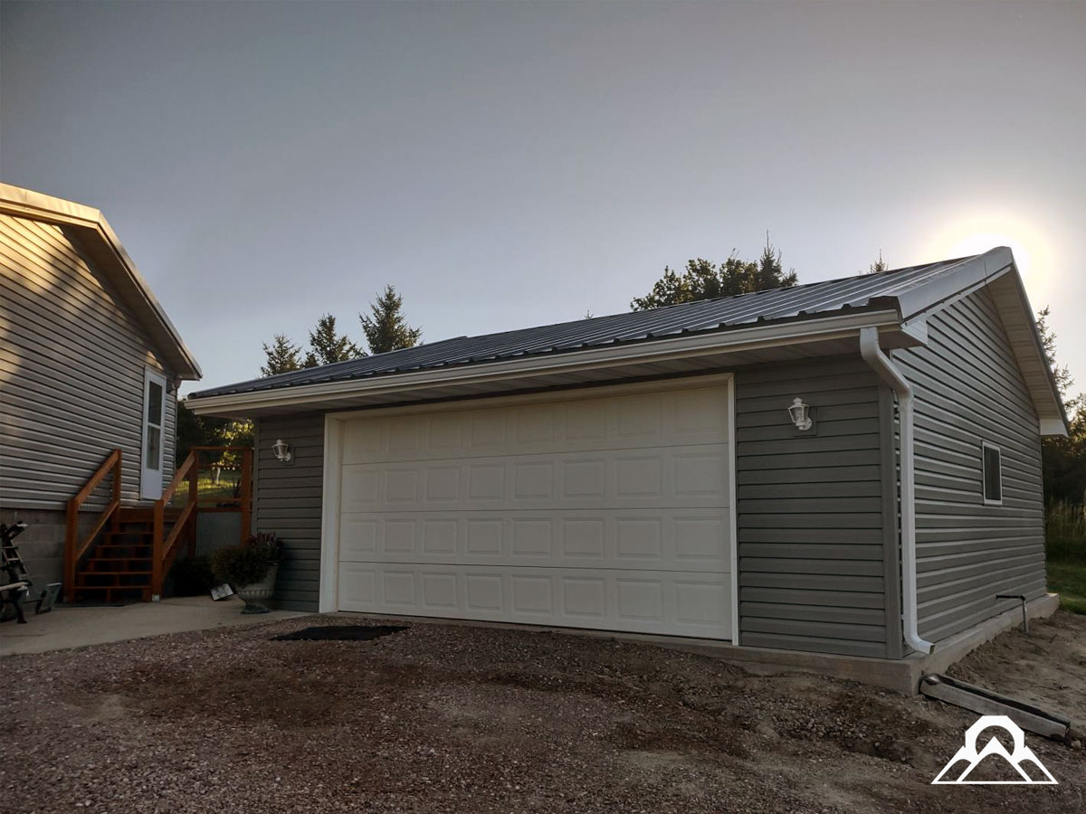 residential-Project_6_roof-replacement_new_metal_roof_gutters_downspouts_siding_windows_after_5